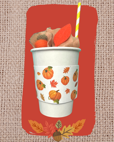 Image of a paper cup with felt and a straw inside made to look like a autumn coffee beverage