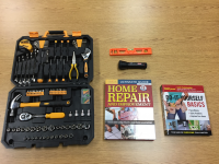 Tool Kit, home repair book, level, flashlight. 